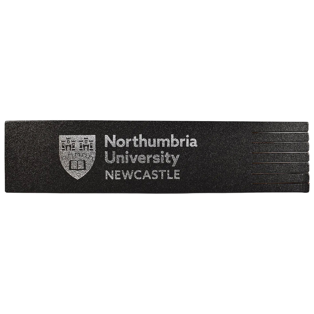 A black rectangular foam block with 'Northumbria University NEWCASTLE' and the university crest printed in white on the left side, shown against a plain white background.